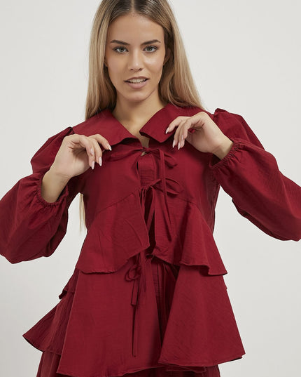 Damenbluse mit Rüschenlagen und Schleifendetails