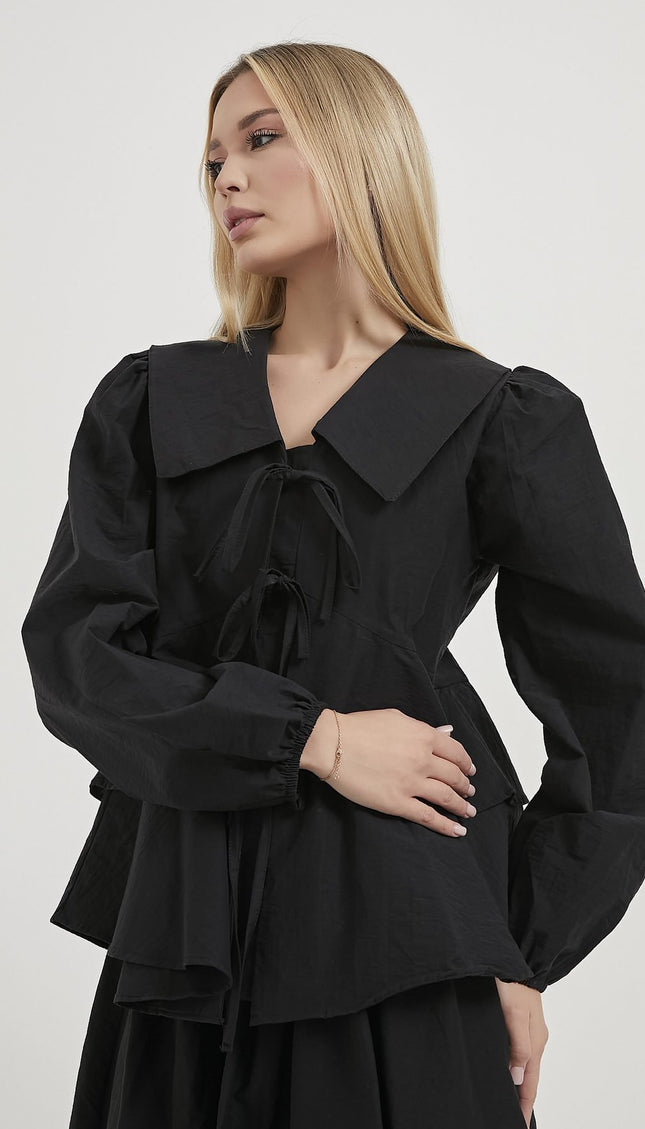 Damenbluse mit Rüschenlagen und Schleifendetails