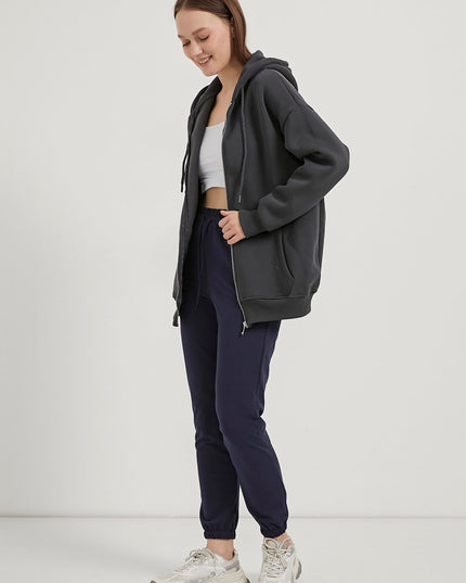 Übergrosser Damenpullover mit Kapuze, Reissverschluss und Riemchen