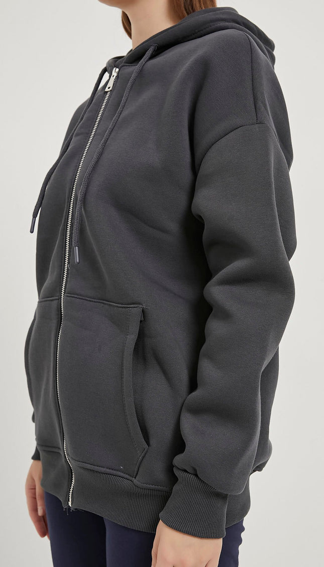 Übergrosser Damenpullover mit Kapuze, Reissverschluss und Riemchen