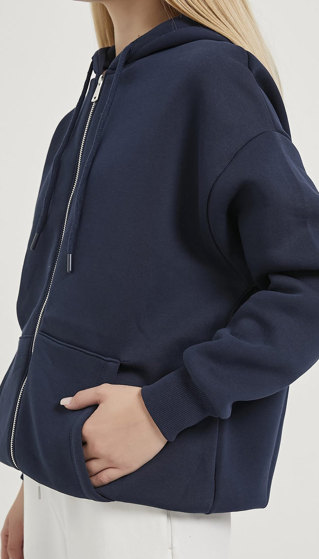 Übergrosser Damenpullover mit Kapuze, Reissverschluss und Riemchen