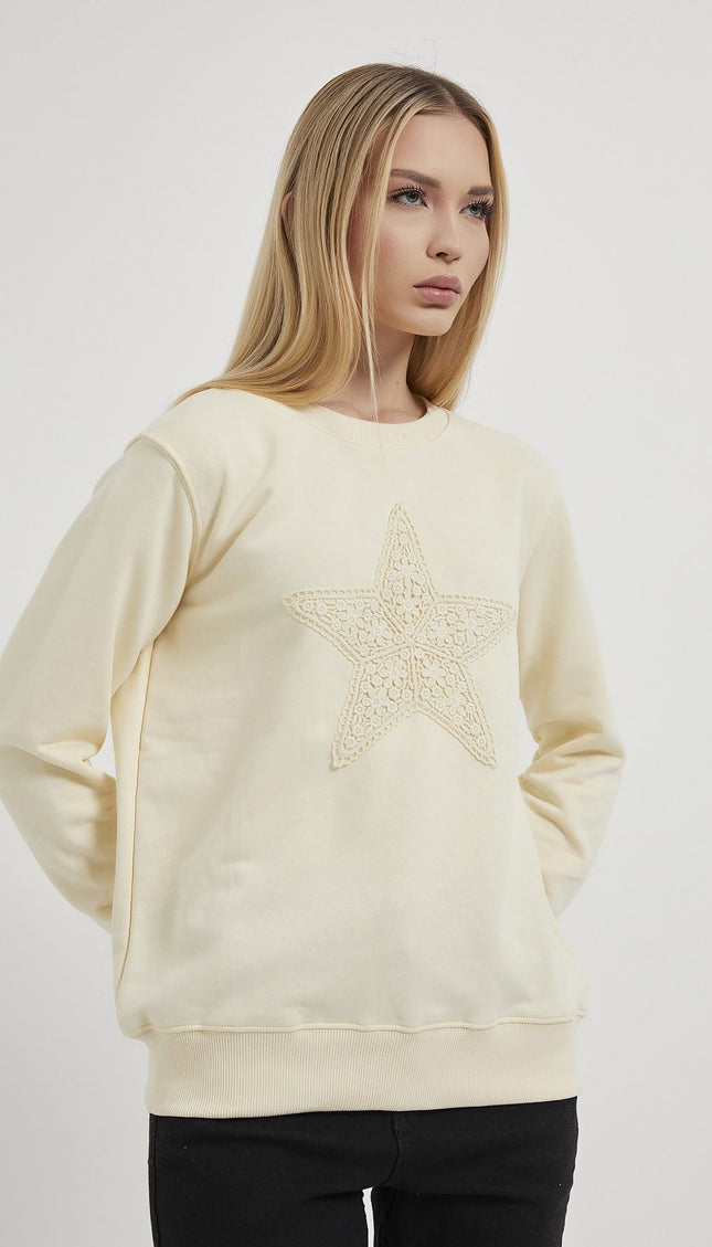 Damenpullover mit Sternstickerei